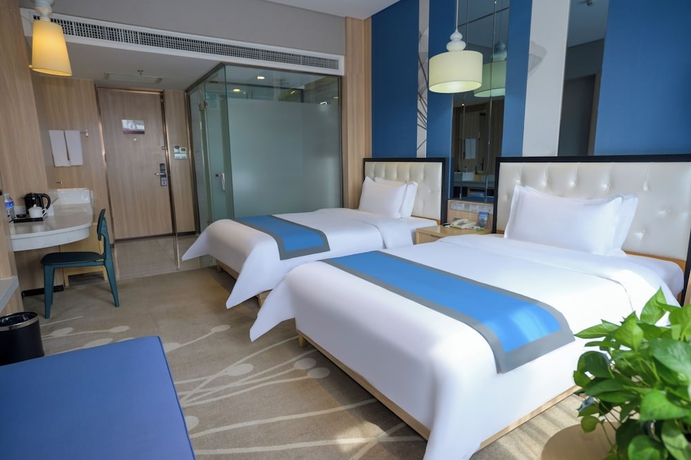 Imagen de la habitación del Hotel Zhong Zhou Elegance. Foto 10