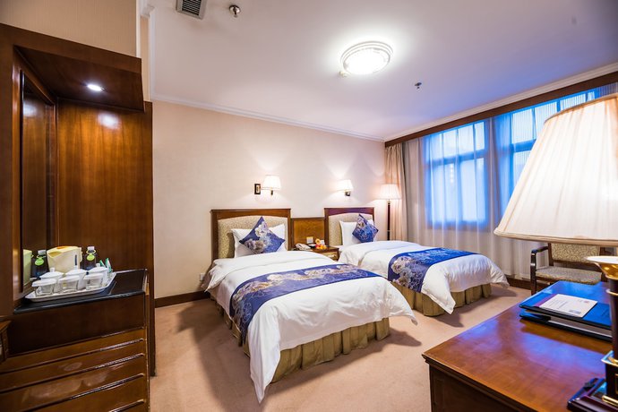 Imagen de la habitación del Hotel Zhongfayuan. Foto 8