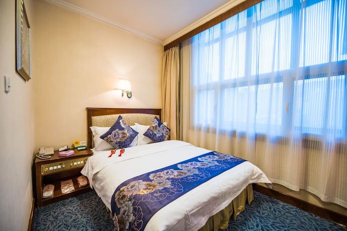 Imagen de la habitación del Hotel Zhongfayuan. Foto 11