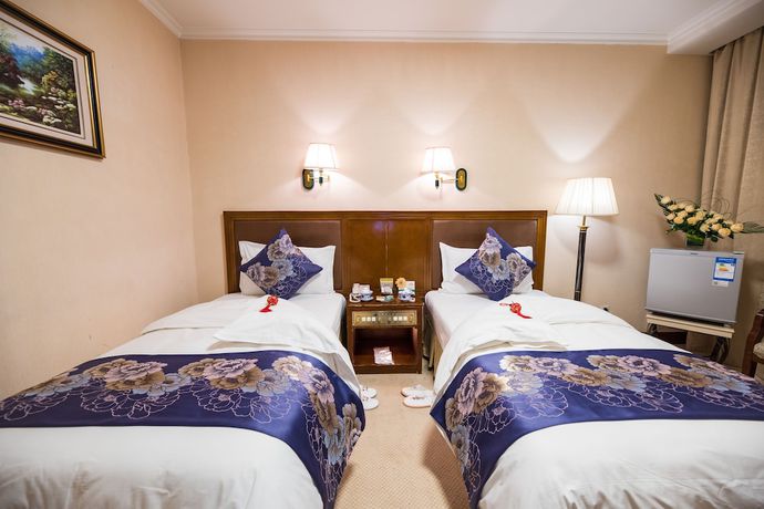 Imagen de la habitación del Hotel Zhongfayuan. Foto 17