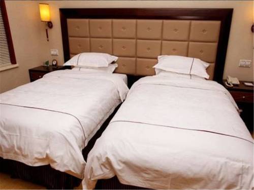 Imagen de la habitación del Hotel Zhongheng International. Foto 6