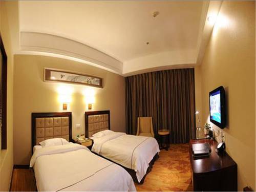 Imagen de la habitación del Hotel Zhongheng International. Foto 7