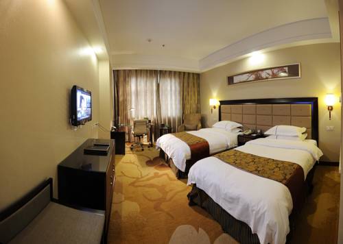 Imagen de la habitación del Hotel Zhongheng International. Foto 12
