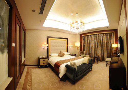 Imagen de la habitación del Hotel Zhongheng International. Foto 13