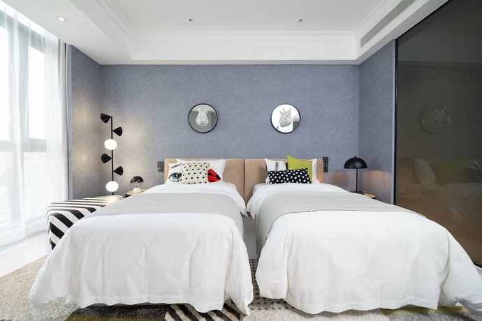Imagen de la habitación del Hotel Zhongjian Rui Beiting Apartment. Foto 6