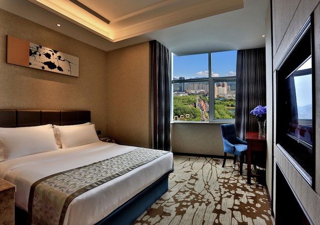 Imagen de la habitación del Hotel Zhonglian Kaixin. Foto 5