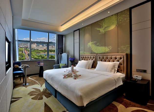 Imagen de la habitación del Hotel Zhonglian Kaixin. Foto 6