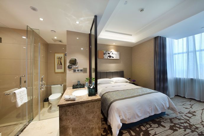 Imagen de la habitación del Hotel Zhonglian Kaixin. Foto 7