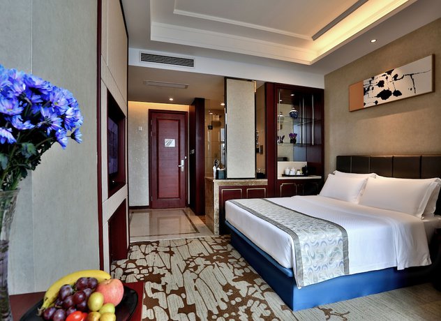 Imagen de la habitación del Hotel Zhonglian Kaixin. Foto 9