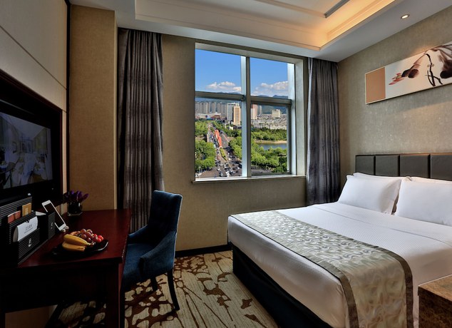 Imagen de la habitación del Hotel Zhonglian Kaixin. Foto 12