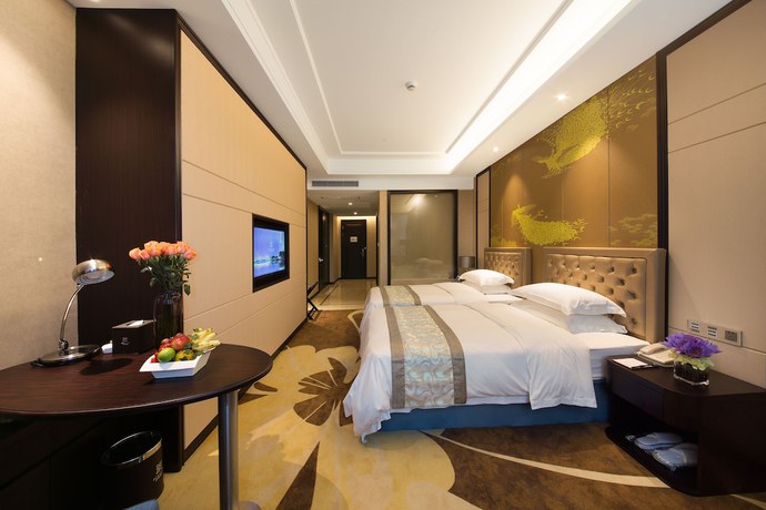 Imagen de la habitación del Hotel Zhonglian Kaixin. Foto 13