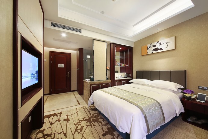 Imagen de la habitación del Hotel Zhonglian Kaixin. Foto 15
