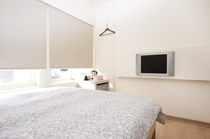 Imagen de la habitación del Hotel Zhongshan 19. Foto 18