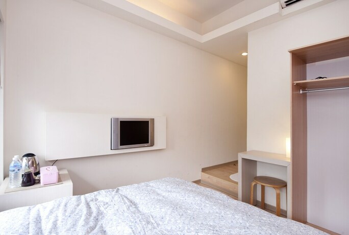 Imagen de la habitación del Hotel Zhongshan 19. Foto 20