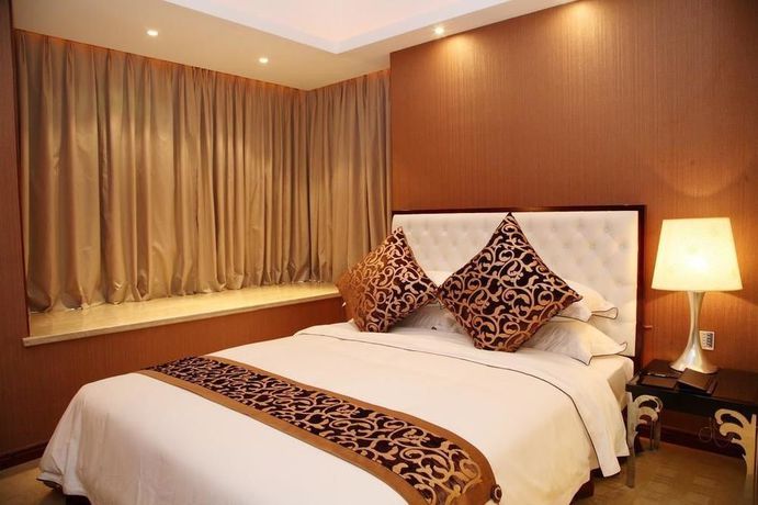 Imagen de la habitación del Hotel Zhongshan Huahong. Foto 5
