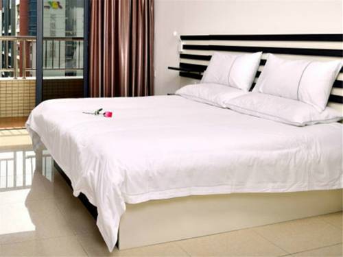 Imagen de la habitación del Hotel Zhongshan International. Foto 3