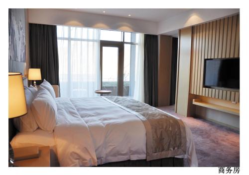 Imagen de la habitación del Hotel Zhongxin Jinling And Resort. Foto 10