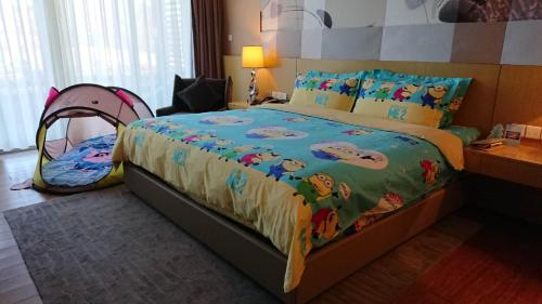 Imagen de la habitación del Hotel Zhongxin Jinling And Resort. Foto 11