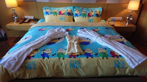 Imagen de la habitación del Hotel Zhongxin Jinling And Resort. Foto 12