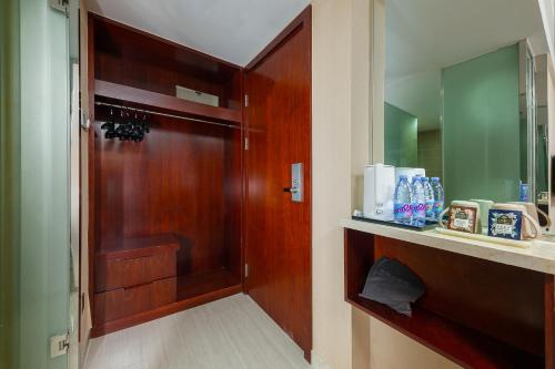 Imagen de la habitación del Hotel Zhongyi - Guangzhou Feixiang Park Metro Station Wanda Plaza. Foto 16