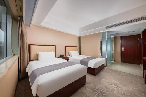 Imagen general del Hotel Zhongyi - Guangzhou Feixiang Park Metro Station Wanda Plaza. Foto 4
