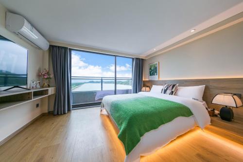 Imagen de la habitación del Hotel Zhoushan Zhujiajian Yuexian. Foto 19