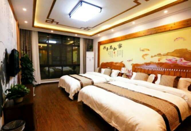 Imagen de la habitación del Hotel Zhouzhuang Chen Jia Boutique Inn. Foto 2