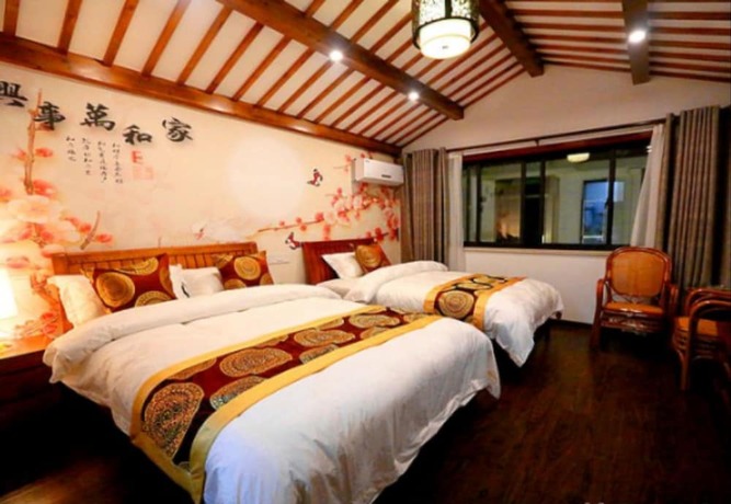 Imagen de la habitación del Hotel Zhouzhuang Chen Jia Boutique Inn. Foto 3