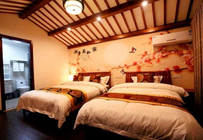 Imagen de la habitación del Hotel Zhouzhuang Chen Jia Boutique Inn. Foto 4