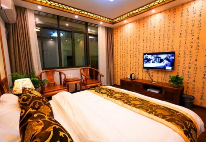 Imagen de la habitación del Hotel Zhouzhuang Chen Jia Boutique Inn. Foto 6