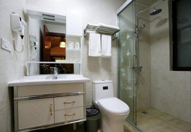Imagen de la habitación del Hotel Zhouzhuang Chen Jia Boutique Inn. Foto 7