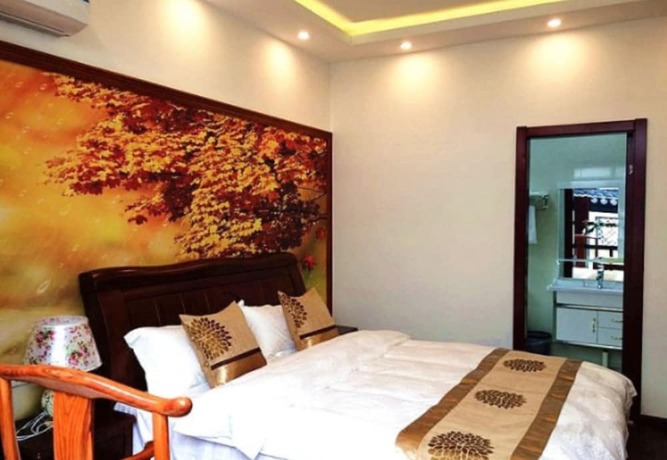 Imagen de la habitación del Hotel Zhouzhuang Chen Jia Boutique Inn. Foto 8
