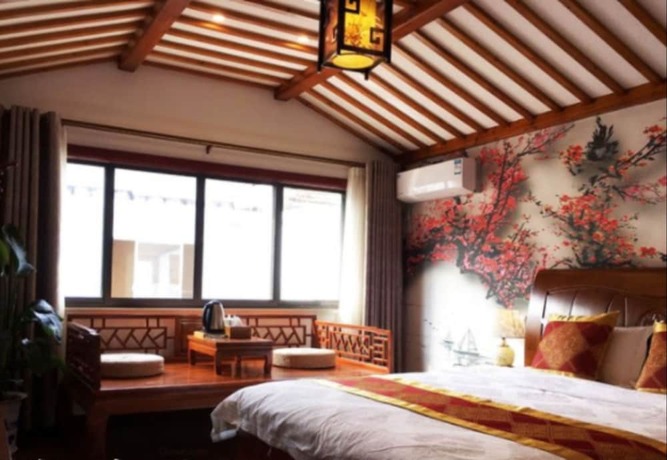 Imagen de la habitación del Hotel Zhouzhuang Chen Jia Boutique Inn. Foto 9