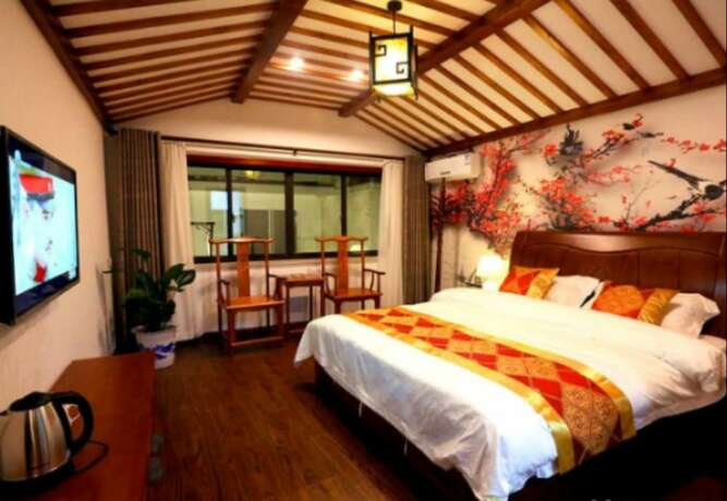 Imagen de la habitación del Hotel Zhouzhuang Chen Jia Boutique Inn. Foto 10