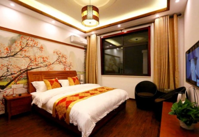 Imagen de la habitación del Hotel Zhouzhuang Chen Jia Boutique Inn. Foto 11