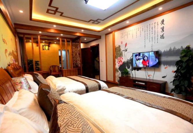 Imagen de la habitación del Hotel Zhouzhuang Chen Jia Boutique Inn. Foto 12