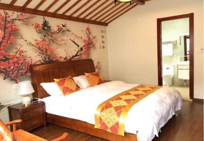 Imagen de la habitación del Hotel Zhouzhuang Chen Jia Boutique Inn. Foto 15
