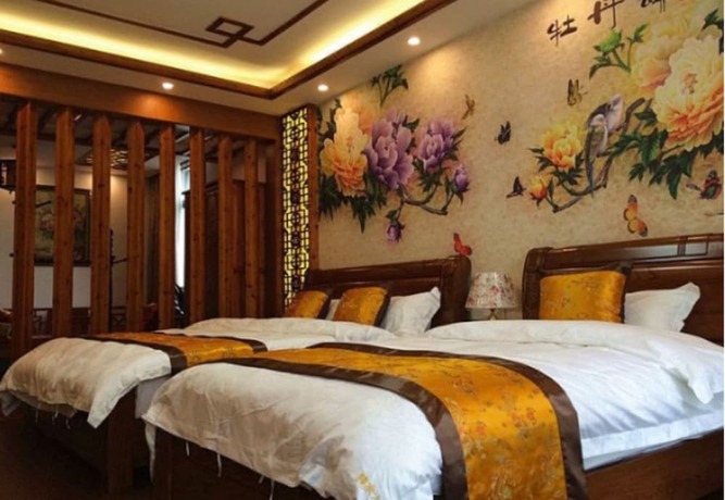 Imagen de la habitación del Hotel Zhouzhuang Chen Jia Boutique Inn. Foto 16