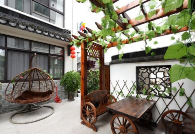 Imagen de los interiores del Hotel Zhouzhuang Chen Jia Boutique Inn. Foto 18