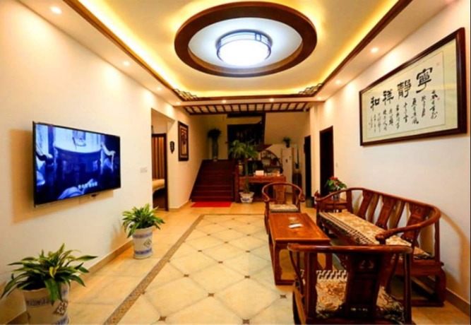 Imagen de los interiores del Hotel Zhouzhuang Chen Jia Boutique Inn. Foto 20