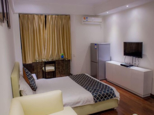 Imagen de la habitación del Hotel Zhu Mei La Apartment. Foto 4