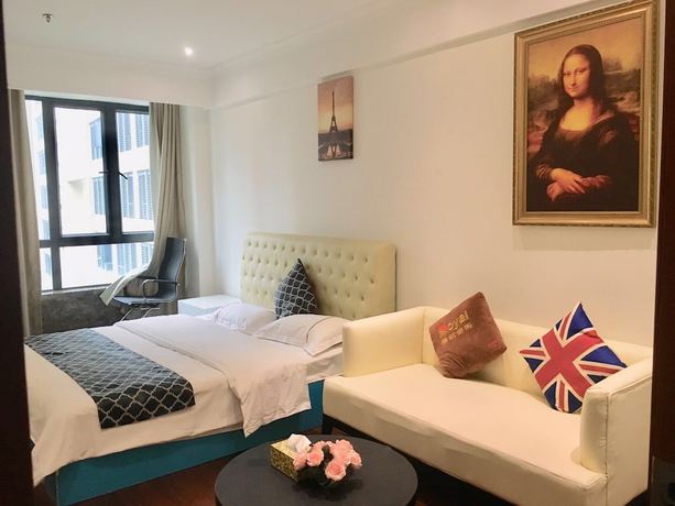 Imagen de la habitación del Hotel Zhu Mei La Apartment. Foto 8