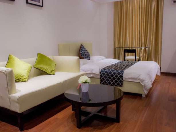 Imagen de la habitación del Hotel Zhu Mei La Apartment. Foto 9