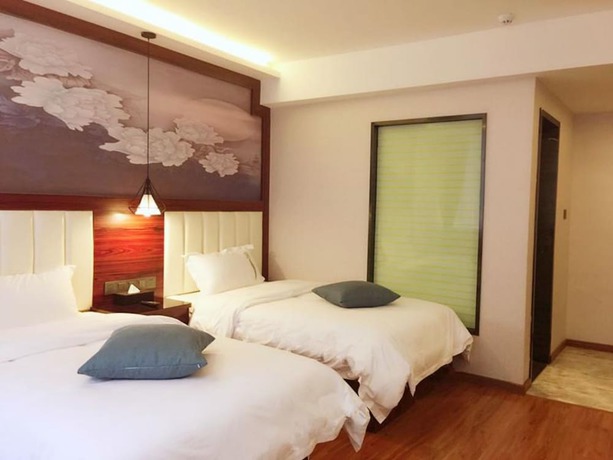 Imagen de la habitación del Hotel Zhu Ying Art. Foto 2