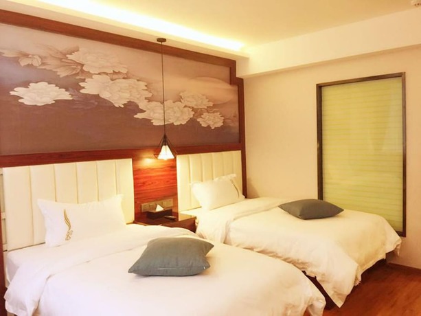 Imagen de la habitación del Hotel Zhu Ying Art. Foto 10