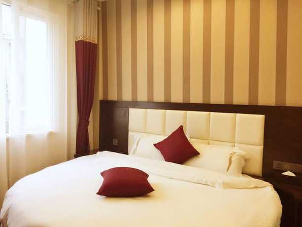 Imagen de la habitación del Hotel Zhu Ying Art. Foto 15