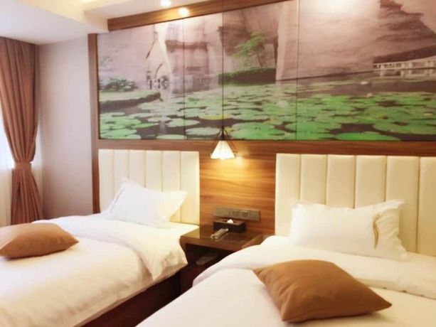 Imagen de la habitación del Hotel Zhu Ying Art. Foto 17