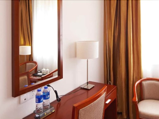 Imagen de la habitación del Hotel Zhu Yuan. Foto 7