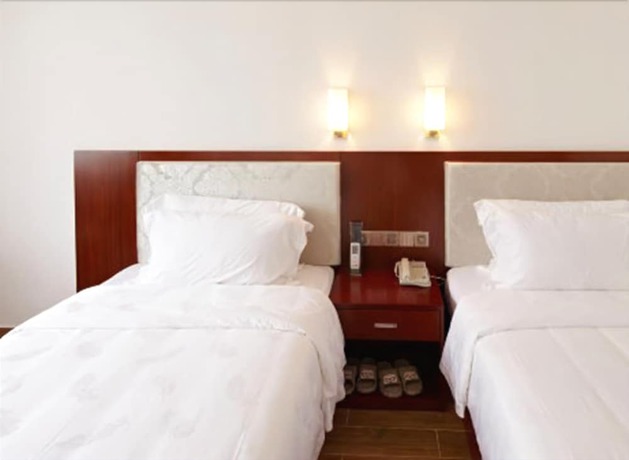 Imagen de la habitación del Hotel Zhu Yuan. Foto 8