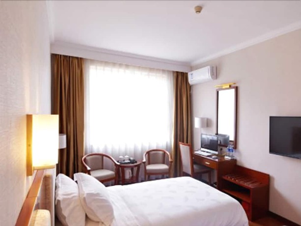 Imagen de la habitación del Hotel Zhu Yuan. Foto 9